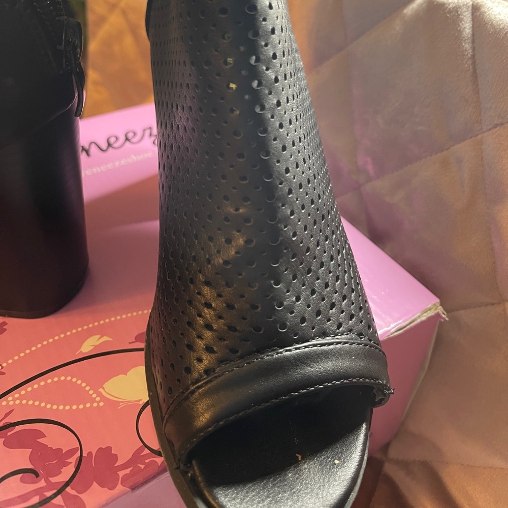 Black toe out bootie